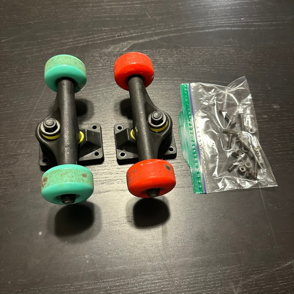Tony Hawk Signature Series Skateboard Trucks with Teal and Red Wheels Hardware